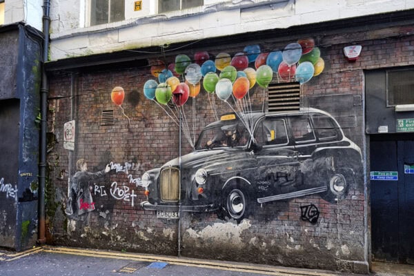 The world's most economical taxi Mural